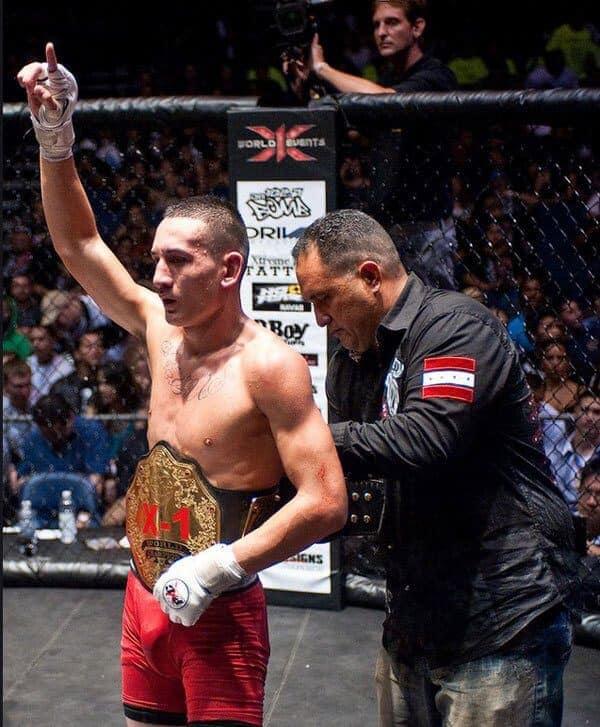 Max Holloway X1 World Events 155lb belt